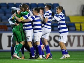 The Morton players celebrate with goalkeeper Jack Hamilton after their penalty shootout victory against Inverness.