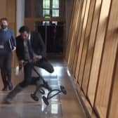 Health secretary Humza Yousaf takes a tumble in the Scottish Parliament. Picture: Contributed