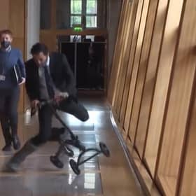 Health secretary Humza Yousaf takes a tumble in the Scottish Parliament. Picture: Contributed
