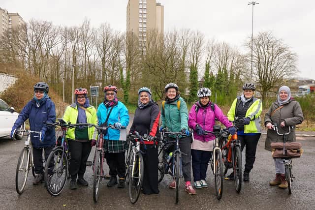 Founder of Women on Wheels, Shgufta Anwar, centre left, with a group ride out. Picture: Women on Wheels