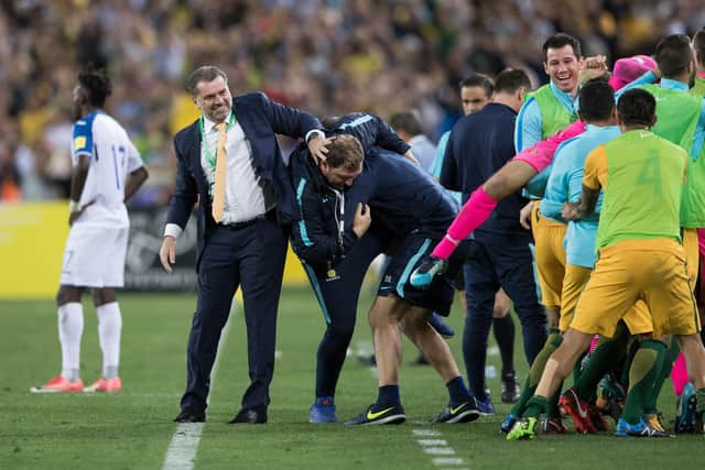 Postecoglou and the Autralia including Ryan McGowan (fourth right) celebrate a goal during 2018 World Cup qualifying