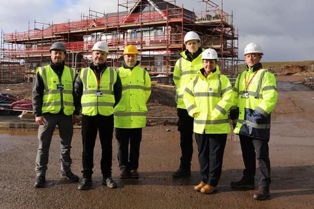 Current construction assessors pictured with key representatives from ESP and CITB at a Taylor Wimpey Site in Cambuslang.