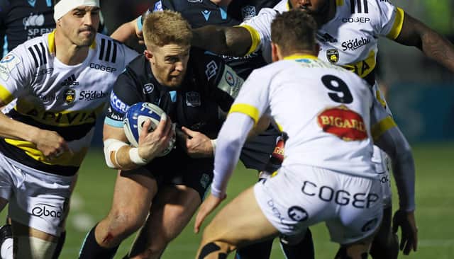 GLASGOW, SCOTLAND - JANUARY 22: Glasgow Warriors' Kyle Steyn drives forward during a European Champions Cup match between Glasgow Warriors and La Rochelle at Scotstoun Stadium, on January 22, 2022, in Glasgow, Scotland. (Photo by Craig Williamson / SNS Group)