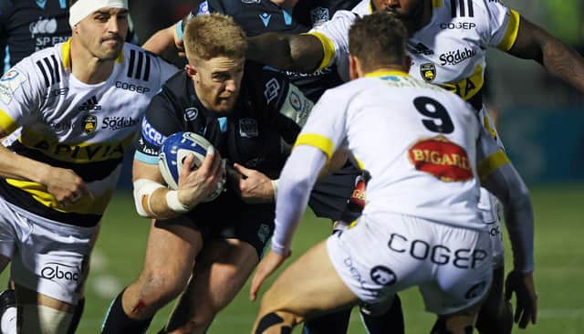 GLASGOW, SCOTLAND - JANUARY 22: Glasgow Warriors' Kyle Steyn drives forward during a European Champions Cup match between Glasgow Warriors and La Rochelle at Scotstoun Stadium, on January 22, 2022, in Glasgow, Scotland.  (Photo by Craig Williamson / SNS Group)