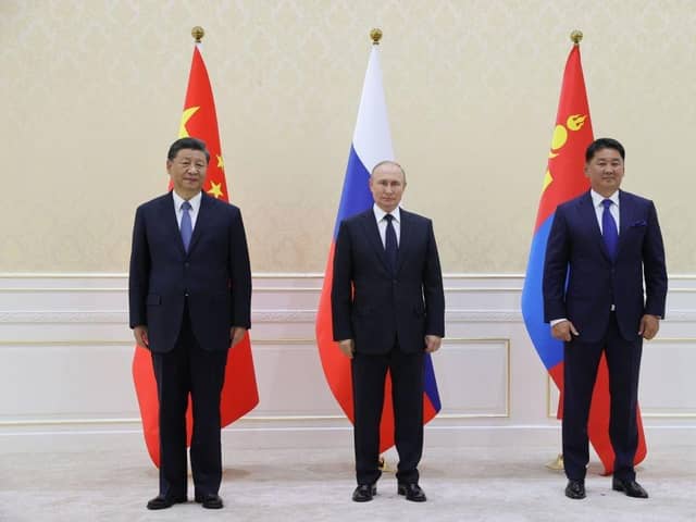 China's President Xi Jinping, Russian President Vladimir Putin and Mongolia's President Ukhnaa Khurelsukh hold a trilateral meeting on the sidelines of the Shanghai Cooperation Organisation leaders' summit in Samarkand. Picture: AFP via Getty Images