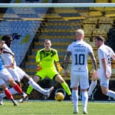 Cowdenbeath's Liam Buchanan fires in the opener to give Livingston a fright in their League Cup match. Photo by Craig Foy / SNS Group