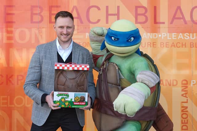 Turtle Pack CEO Ryan Carenduff with Leonardo, one of the Teenage Mutant Ninja Turtles. Picture: Stephen Lee