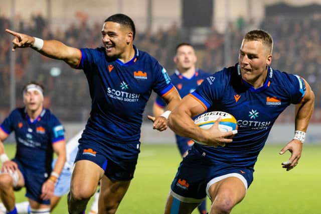 Edinburgh's Duhan van der Merwe runs though for a try as teammate Mosese Tuipulotu celebrates but it was Leinster who won, 33-31, at Hive Stadium. (Photo by Ross Parker / SNS Group)