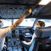 Director of Flight Operations Captain David Morgan and Captain Kate McWilliams in the cockpit of easyJet flight EZY883 before it takes-off from London Gatwick bound for Glasgow