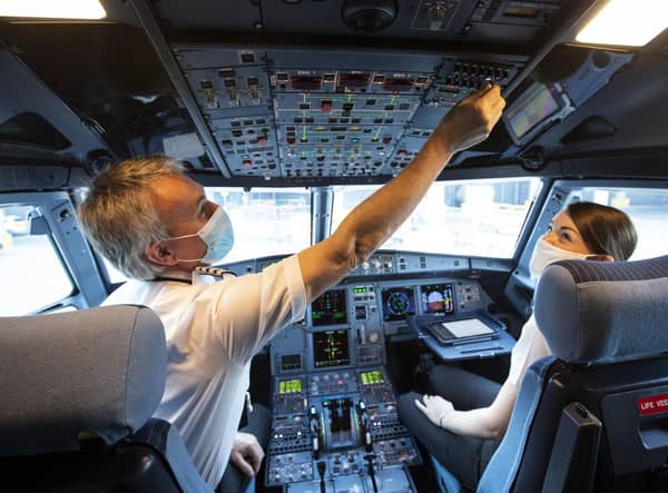 Director of Flight Operations Captain David Morgan and Captain Kate McWilliams in the cockpit of easyJet flight EZY883 before it takes-off from London Gatwick bound for Glasgow