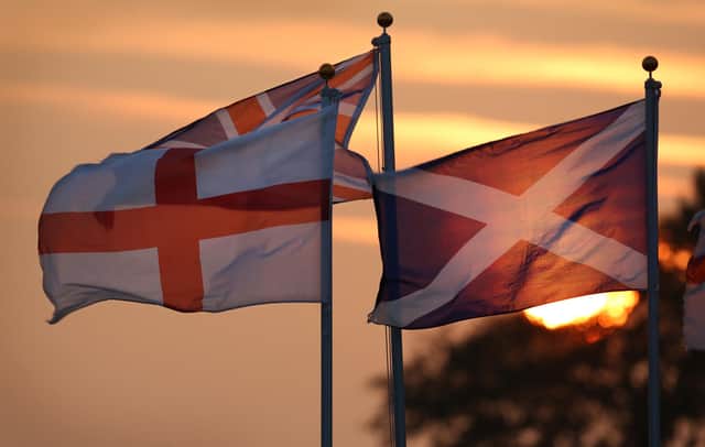 The Saltire of Scotland and St George's Cross of England stand side by side (Picture: Peter Macdiarmid/Getty Images)