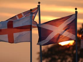 The Saltire of Scotland and St George's Cross of England stand side by side (Picture: Peter Macdiarmid/Getty Images)
