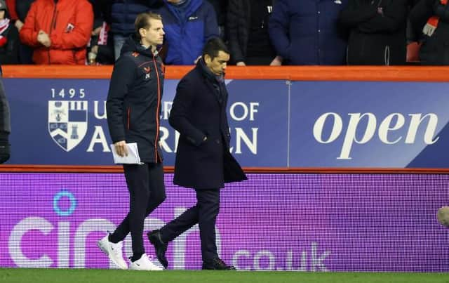 Rangers manager Giovanni van Bronckhorst walks back to the dressing room at the end of his team's 1-1 draw against Aberdeen at Pittodrie. (Photo by Craig Williamson / SNS Group)