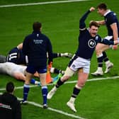 Full-back and captain Stuart Hogg celebrates wildly as Duhan van der Merwe scores the winning try in the final seconds of the 2021 match against France on Scotland's last visit to Paris.