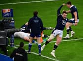 Full-back and captain Stuart Hogg celebrates wildly as Duhan van der Merwe scores the winning try in the final seconds of the 2021 match against France on Scotland's last visit to Paris.
