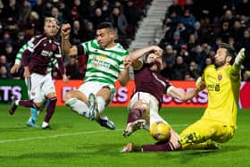 Celtic's Giorgios Giakoumakis scores to make it 2-0 against Hearts at Tynecastle. (Photo by Ross Parker / SNS Group)