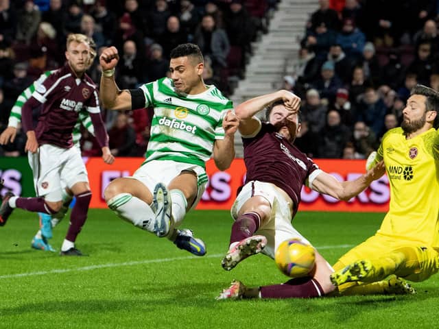 Celtic's Giorgios Giakoumakis scores to make it 2-0 against Hearts at Tynecastle. (Photo by Ross Parker / SNS Group)