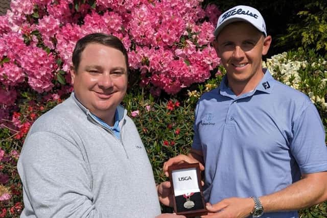 Grant Forrest is presented with his medal by Greg Sanfilippo, the USGA's Senior Director of Championships, after sharing top spot in the US Open qualifier at Walton Heath last month. Picture: USGA