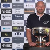 Craig Lee shows off the Barassie Links Classic trophy after his victory in an event presented by The MacKay Clinic at Kilmarnock (Barassie). Picture: Tartan Pro Tour