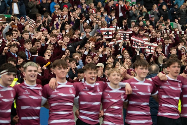 George Watson's players and fans celebrate after their under-16 cup final win over Dollar Academy