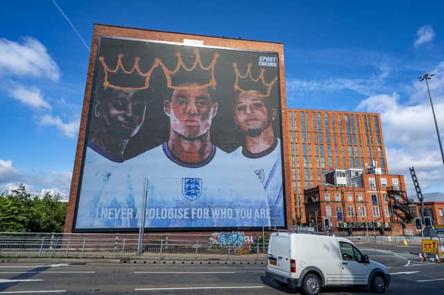 A mural of England players Marcus Rashford, Jadon Sancho and Bukayo Saka in Manchester after they were subjected to racist abuse (Picture: Peter Byrne/PA Wire)