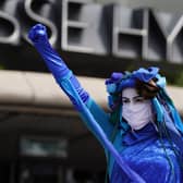 Extinction Rebellion Scotland's Blue Rebels perform outside the SEC in Glasgow, where the global climate change conference Cop26 will take place in November.