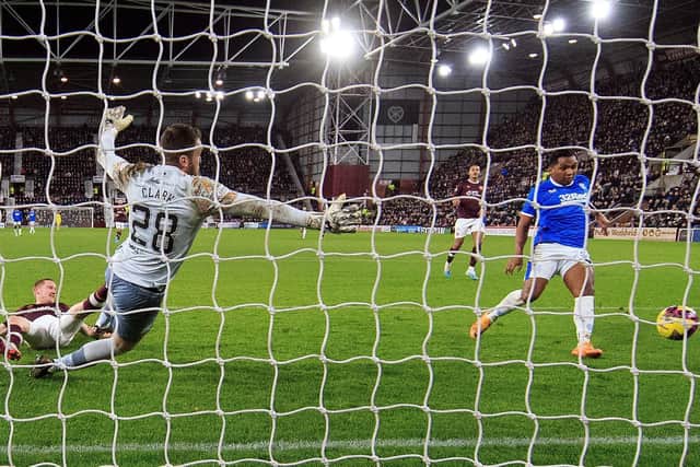Alfredo Morelos scored twice as Rangers defeated Hearts 3-0 at Tynecastle.