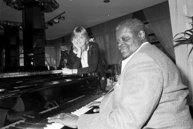Canadian-born jazz composer and pianist Oscar Peterson at the piano during a visit to Edinburgh in April 1982.