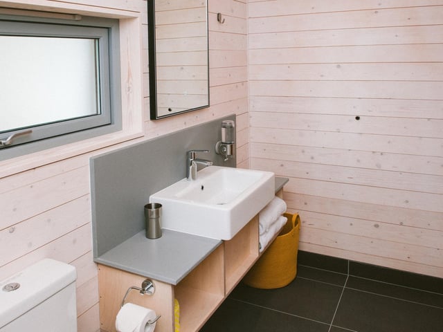 The bathrooms are simple and stylish, with piping hot showers to relax in after a day's adventures.