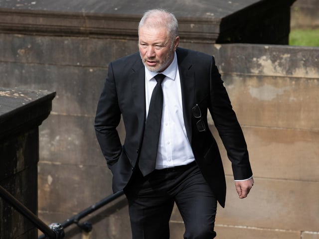 Former Rangers player and manager Ally McCoist arrives at the funeral of Rangers kitman Jimmy Bell