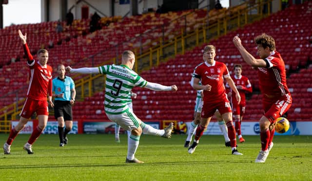 Celtic's Leigh Griffiths nets with the sort of sublime finish that makes him worth a call-up by Scotland manager Steve Clarke for the Serbia play-off (Photo by Alan Harvey / SNS Group)