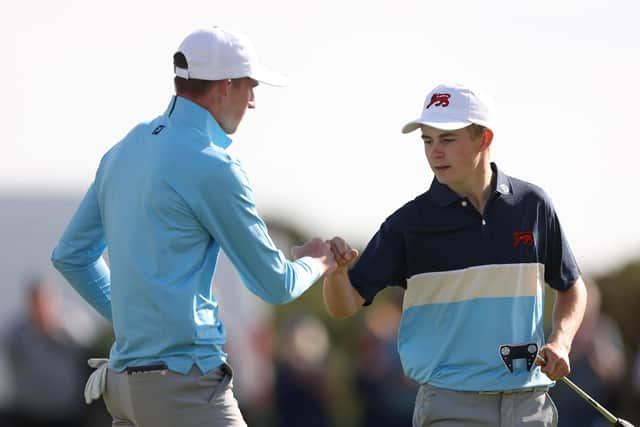 Calum Scott, left, and Connor Graham react during the Saturday Foursomes on day one of the 49th Walker Cup at St Andrews. Picture: Oisin Keniry/R&A/R&A via Getty Images.