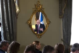 John Swinney speaks to the press conference at which he accused Nigel Farage of being an 'accomplice of Russia' (Picture: Jane Barlow/PA Wire)
