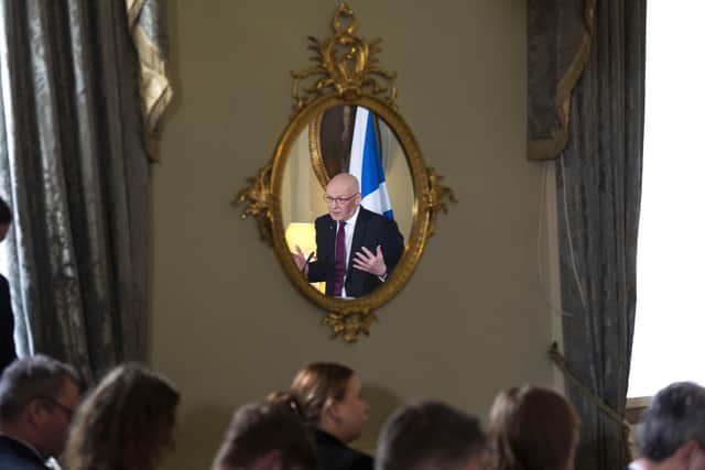 John Swinney speaks to the press conference at which he accused Nigel Farage of being an 'accomplice of Russia' (Picture: Jane Barlow/PA Wire)