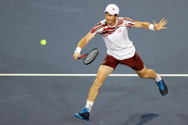 Andy Murray returns a shot to Richard Gasquet during the Western & Southern Open at Lindner Family Tennis Center in Mason, Ohio. (Photo by Matthew Stockman/Getty Images)