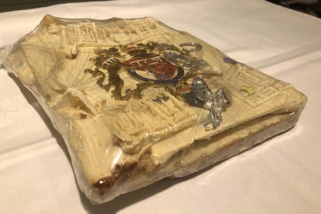 The slice of cake from one of the 23 official wedding cakes made for the Royal Wedding of HRH Prince Charles and Lady Diana Spencer on Wednesday 29th July 1981.