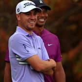 Justin Thomas and Tiger Woods, pictured during the PNC Championship in Florida last December, are close friends. Picture: Mike Ehrmann/Getty Images.
