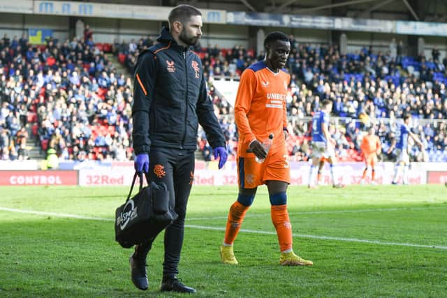 Rangers forward Fashion Sakala leaves the field with an injury during the 2-1 defeat to St Johnstone. (Photo by Ross MacDonald / SNS Group)