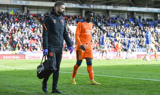 Rangers forward Fashion Sakala leaves the field with an injury during the 2-1 defeat to St Johnstone. (Photo by Ross MacDonald / SNS Group)