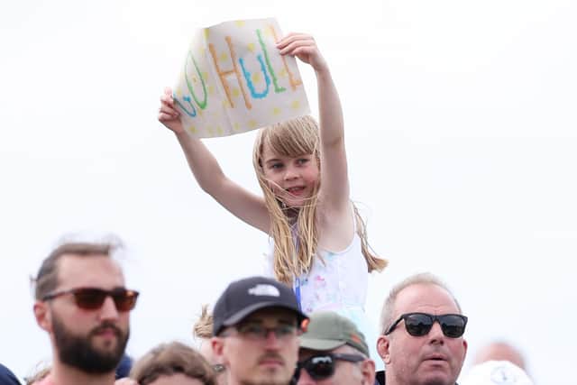 A young fan shows her support for Charley Hull during the AIG Women's Open. Picture: Richard Heathcote/R&A/R&A via Getty Images.