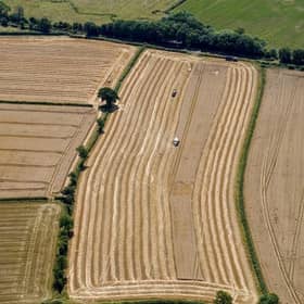 A field of wheat harvested near Cotswold Airport, Gloucestershire