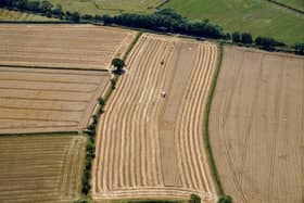A field of wheat harvested near Cotswold Airport, Gloucestershire