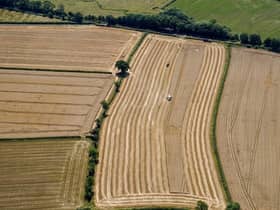 A field of wheat harvested near Cotswold Airport, Gloucestershire
