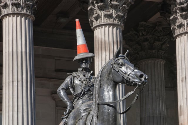 The statue depicts Arthur Wellesley (1st Duke of Wellington) and can be found outside Glasgow’s Gallery of Modern Art. It is famous for being capped with a traffic cone in a move said to reflect the local Glaswegian humour - this has been done since at least the 1980s.