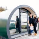 The Laurie family next to one of the Mull pods.