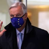 EU chief Brexit negotiator Michel Barnier, wearing an EU flag-themed facemask due to the novel coronavirus pandemic, leaves a hotel in London. Picture: Tolga Akmen/AFP via Getty Images