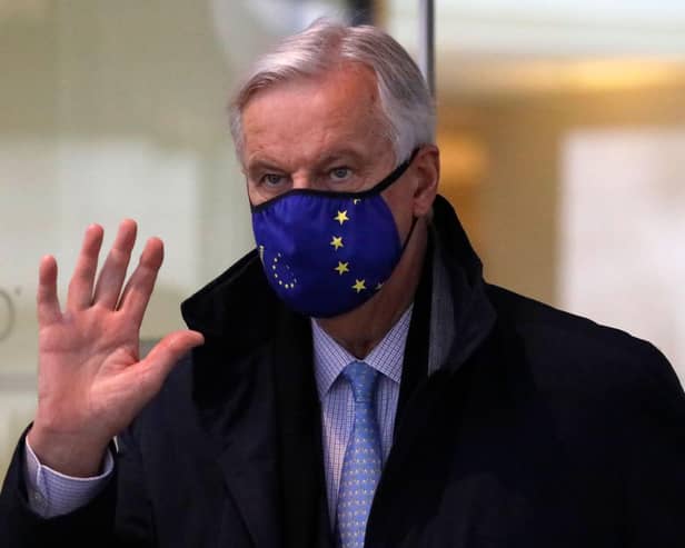 EU chief Brexit negotiator Michel Barnier, wearing an EU flag-themed facemask due to the novel coronavirus pandemic, leaves a hotel in London. Picture: Tolga Akmen/AFP via Getty Images