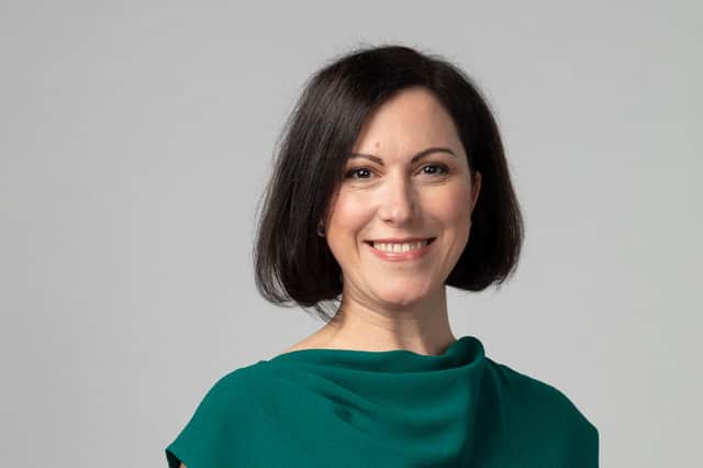 Claudia Cavalluzzo, Director Converge