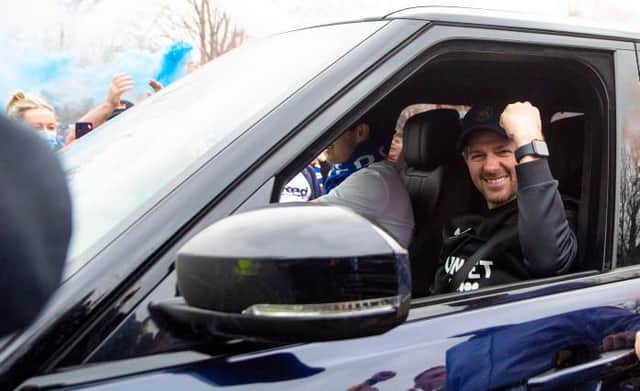 Steven Gerrard greets jubilant Rangers fans outside the club's training ground after his squad were confirmed as the new Premiership champions this month. (Photo by Ross MacDonald / SNS Group)