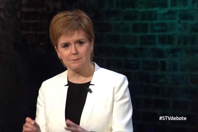 First Minister Nicola Sturgeon asks a question of Scottish Liberal Democrats leader Willie Rennie. Picture: STV